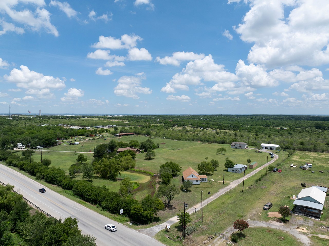 located near the circuit of america's formula one racetrack current use as event center with ballroom and clubhouse. travis county is buying road frontage to expand fm 812